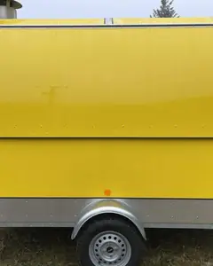 Détail de la carrosserie de la remorque coloris jaune